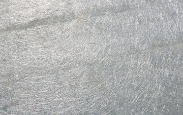 Comiston laminate fibreglass or shingles?